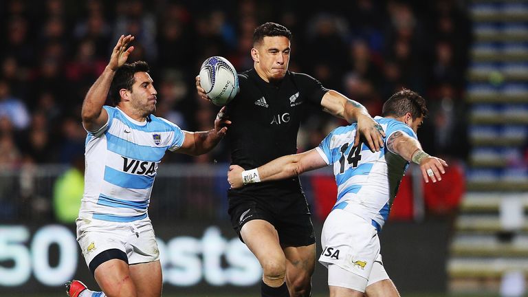 Sonny Bill Williams looks to get his hands free and off load against Argentina