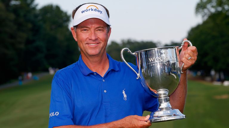 Davis Love III with the Wyndham Championship trophy