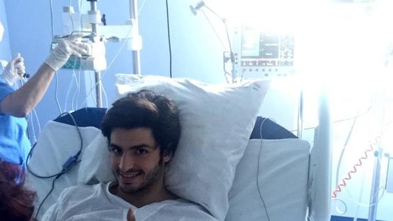 Carlos Sainz's manager posted a picture of the driver sitting up and giving the thumbs-up from hospital