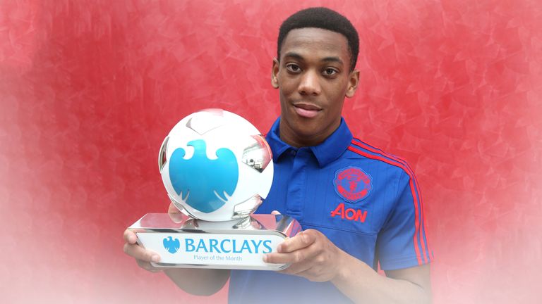 Anthony Martial of Manchester United poses with his Barclays Player of the Month award