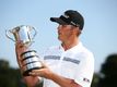 Matt Jones of Australia poses with the Stonehaven trophy after winning the 2015 Australian Open