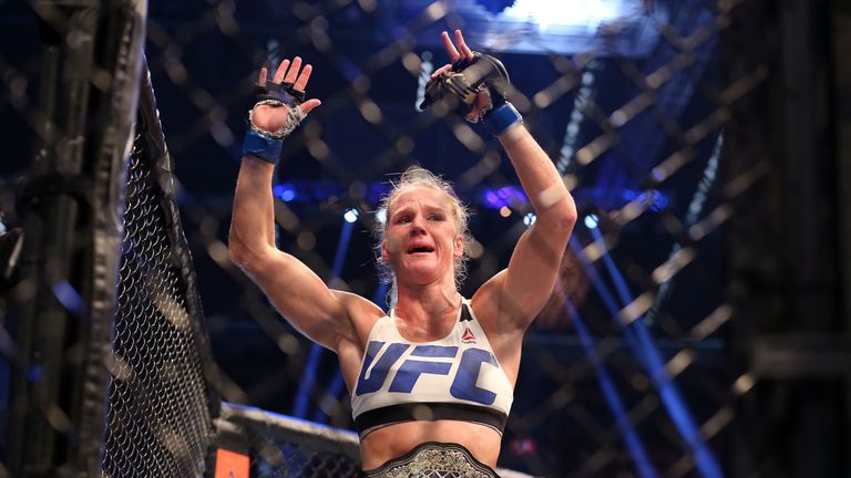 Holm celebrates her title win