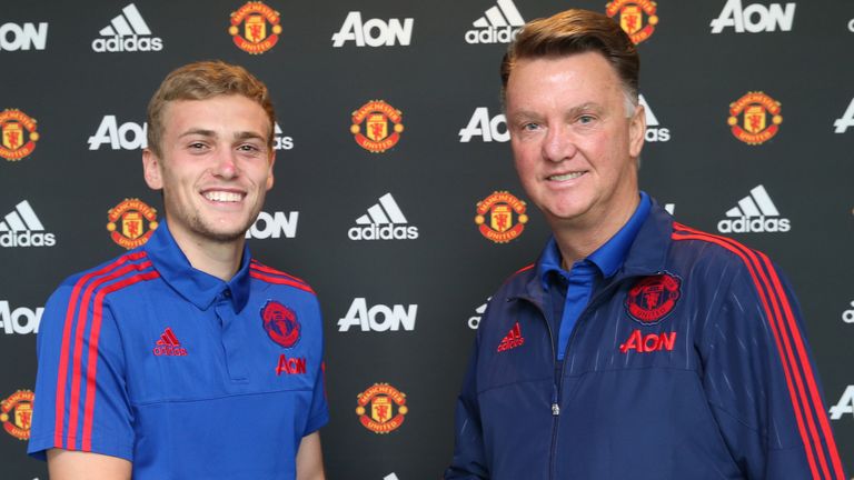 Wilson with Louis Van Gaal after signing a five-year contract extension in September