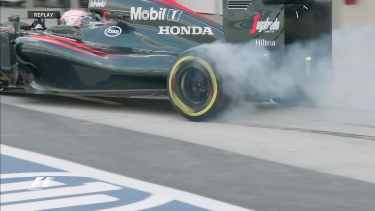 Jenson Button lights up his McLaren's rear tyres as he leaves the pits. The Briton finished P1 one place ahead of team-mate Fernando Alonso in 13th