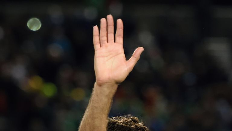 Raul waves to the crowd after playing the final match of his career