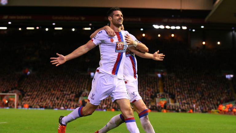 Scott Dann celebrates scoring his side's winner at Anfield last season