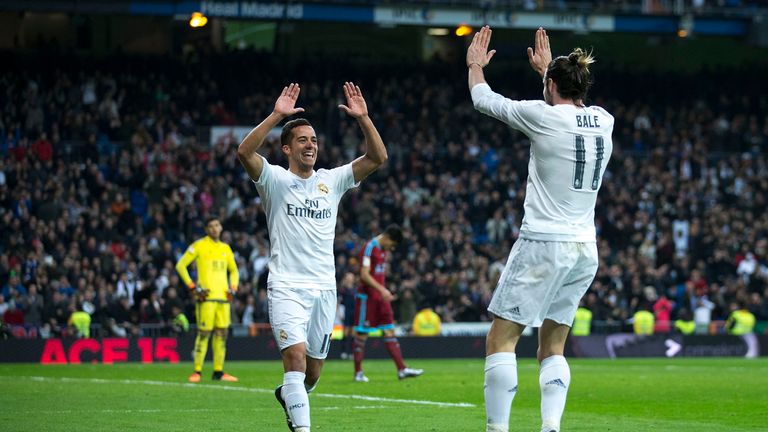 Lucas Vazquez (left) celebrates scoring Real Madrid's third goal with Gareth Bale