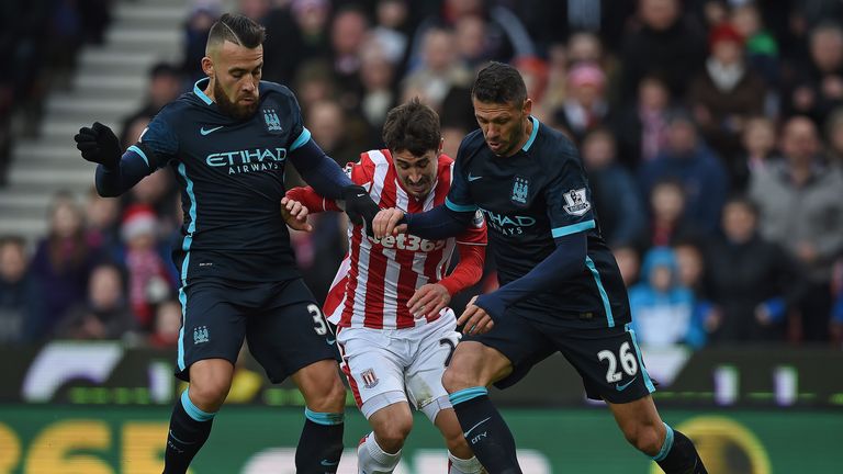 Manchester City's Argentine centre-backs Nicolas Otamendi and Martin Demichelis endured a tough afternoon at the Potteries on Saturday
