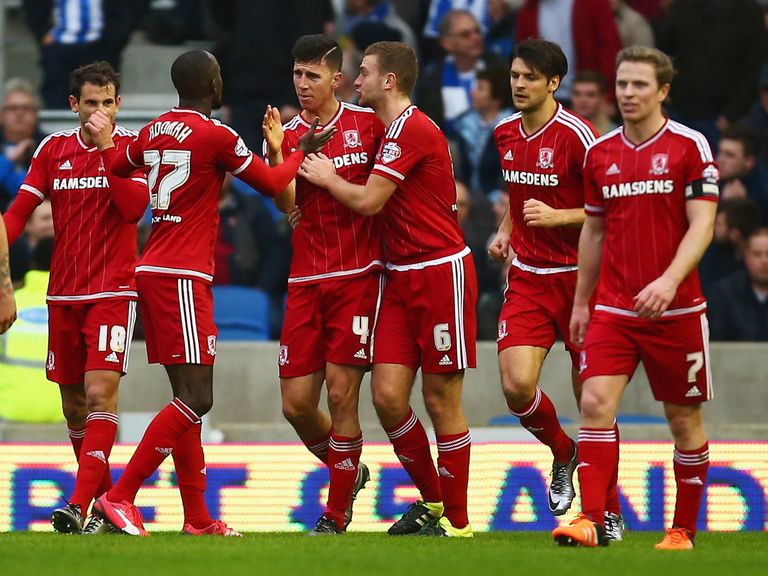 Albert Adomah of Middlesbrough celebrates with Daniel Ayalaand team-mates