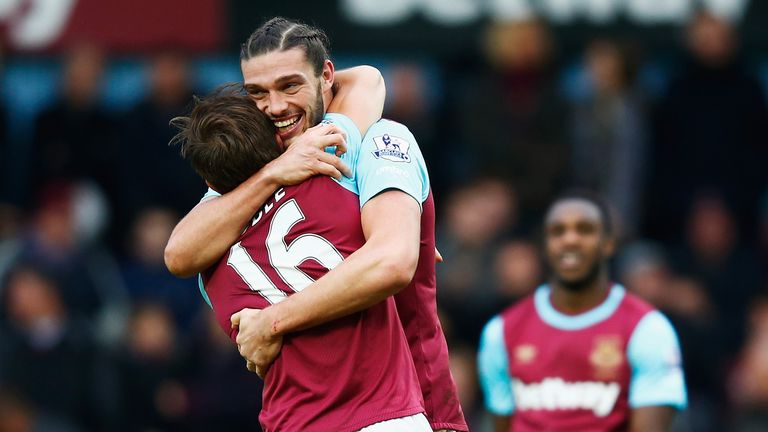 Carroll and Mark Noble embrace after West Ham's second