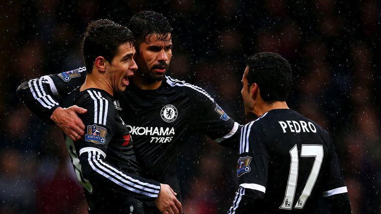 Oscar (left) celebrates his opening goal with Diego Costa and Pedro (right)