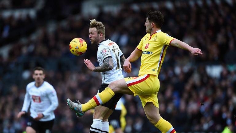 Johnny Russell battles with Joe Walsh