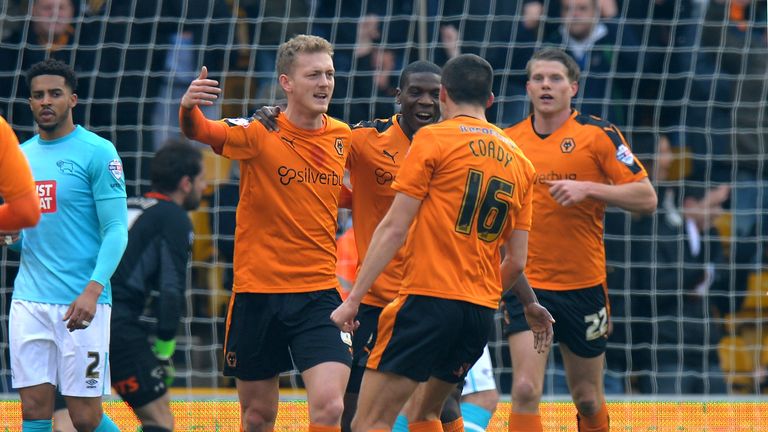 George Saville celebrates after scoring the first goal of the game at Molineux