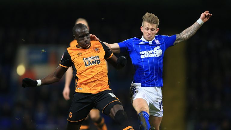 Diame and Luke Hyam do battle in midfield