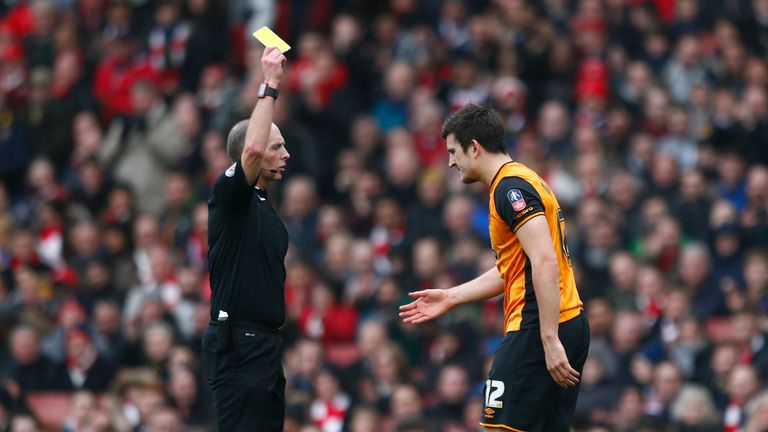 Harry Maguire was shown a yellow card by referee Mike Dean for a dive in the first half