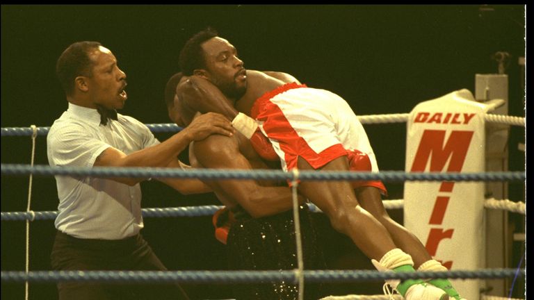 Benn (L) was unable to keep Eubank at bay in 1990