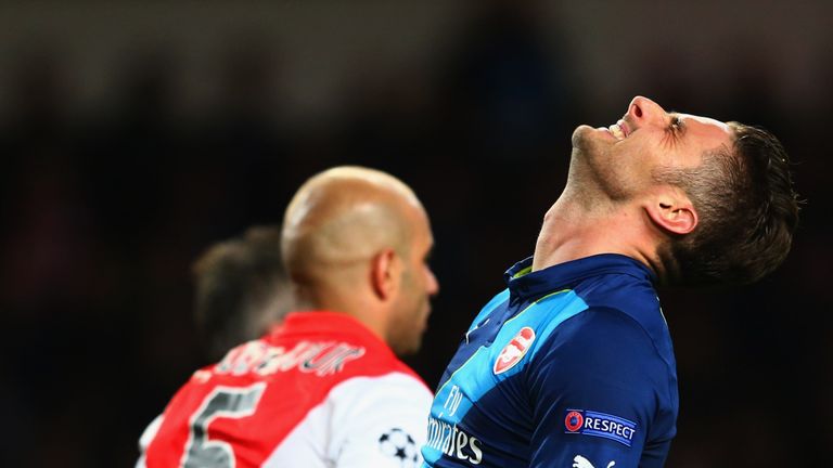 Olivier Giroud shows the strain after last year's tie with Monaco