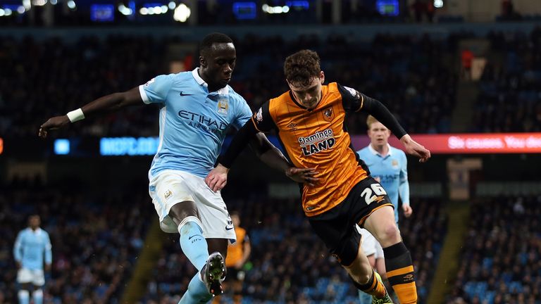 Bacary Sagna (left) is confident Manchester City can overhaul Leicester