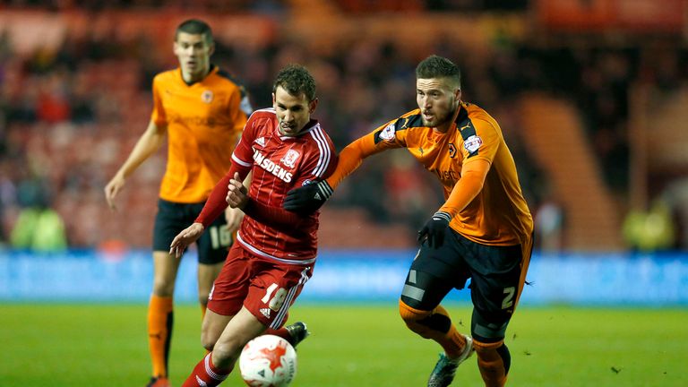 Christian Stuani tries to get away from Matt Doherty in the first half