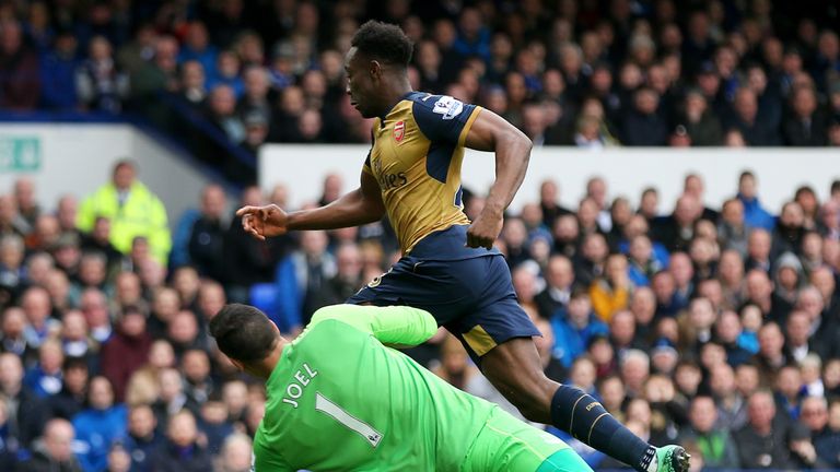 Danny Welbeck rounds Joel Robles before scoring Arsenal's opening goal