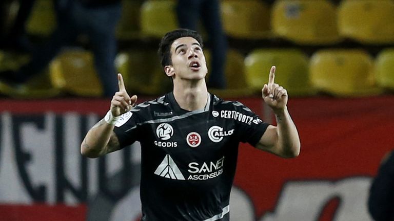Reims midfielder Diego celebrates after scoring