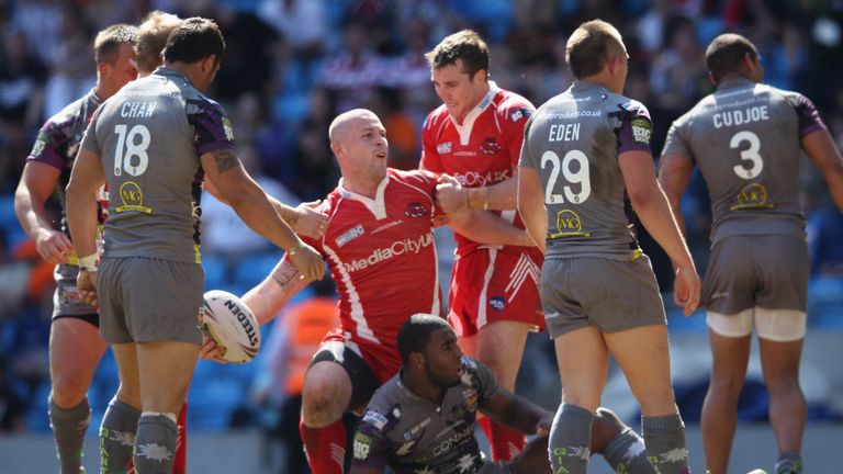 Adam Sidlow celebrates scoring a try for Salford in their thrilling victory