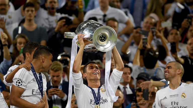 Cristiano Ronaldo of Real Madrid lifts the Champions League trophy