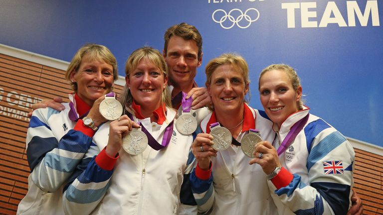 Zara Tindall and GB team-mates (L-R) Mary King, Nicola Wilson, William Fox-Pitt and Kristina Cook show off their silver medals won at London 2012