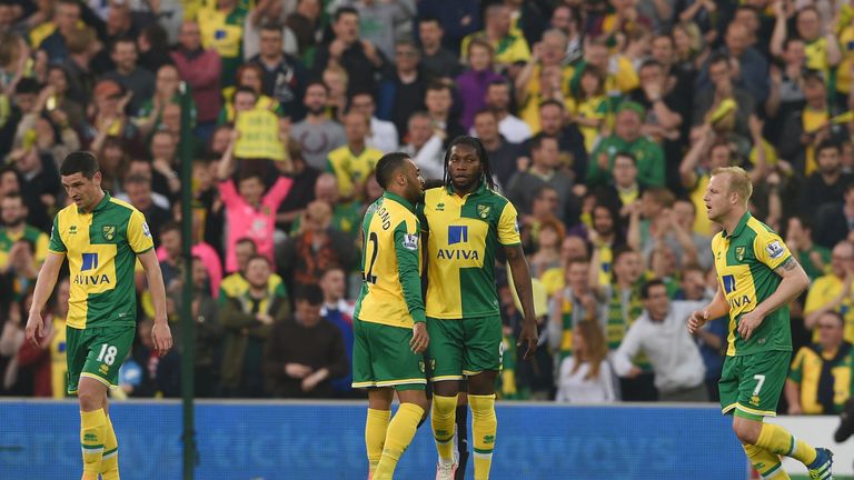 Dieumerci Mbokani celebrates his brace against Watford at a downbeat Carrow Road