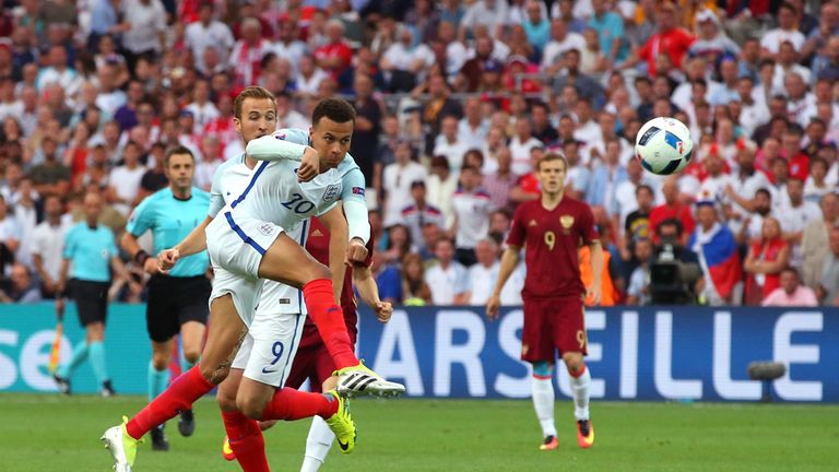 Dele Alli volleys an effort towards goal