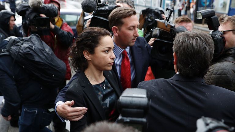 Former Chelsea club doctor Eva Carneiro (C) leaves the employment tribunal in Croydon