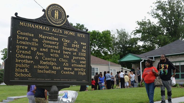 Visitors line up to visit and pay respects outside Muhammad Ali's childhood home