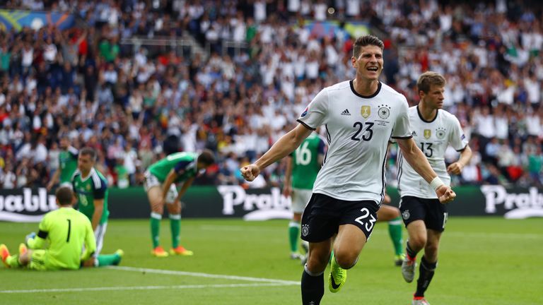 Mario Gomez of Germany celebrates scoring the winner