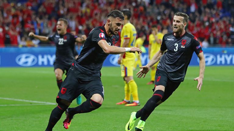 Armando Sadiku celebrates scoring the winning goal for Albania against Romania