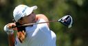 Lee leads after record round
