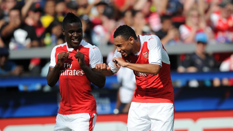 Joel Campbell and Francis Coquelin celebrate