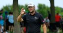 Moore claims John Deere title