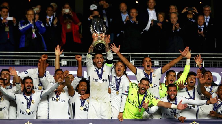 Sergio Ramos lifts the trophy after his Real Madrid's victory in the UEFA Super Cup final