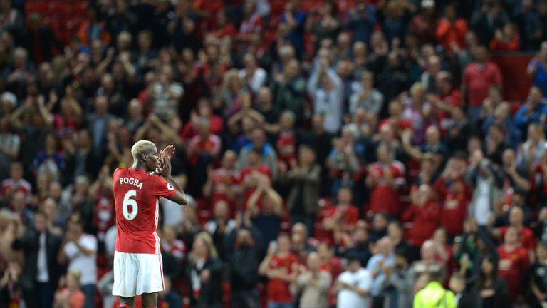Paul Pogba applauds the fans at Old Trafford