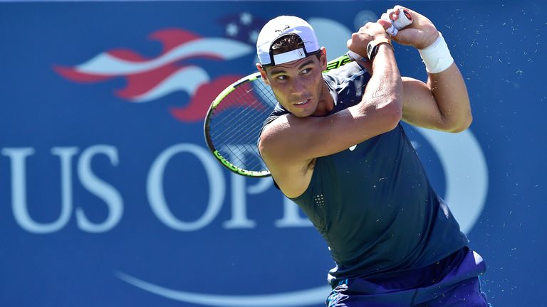 US Open: Novak Djokovic advances with painful first-round win