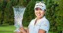 Kim's 63 seals Masters crown