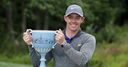 McIlroy roars to Boston crown
