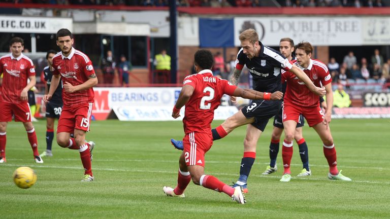 Dundee left-back Kevin Holt scores his first of three goals so far this season against Aberdeen in September