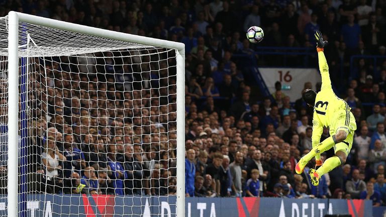 Thibaut Courtois fails to save the long-range shot from Jordan Henderson