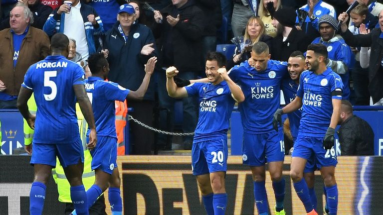 Shinji Okazaki of Leicester enjoys his moment with his team-mates