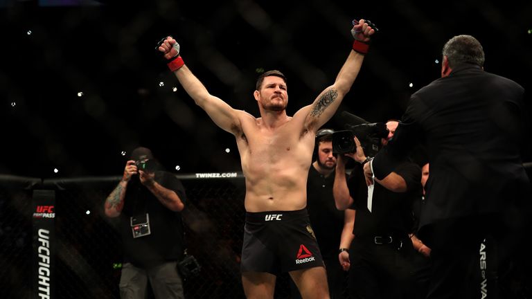Michael Bisping celebrates after defeating Dan Henderson at Manchester Arena