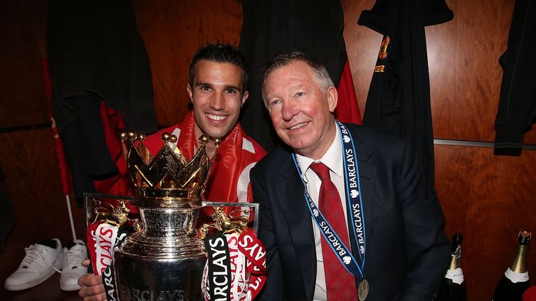 Van Persie and Sir Alex Ferguson celebrate winning the Premier League in 2013