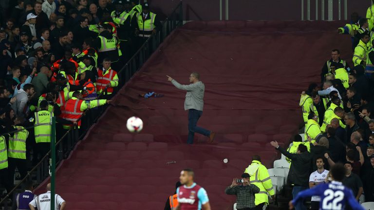 Chelsea and West Ham fans threw missiles across a segregated area