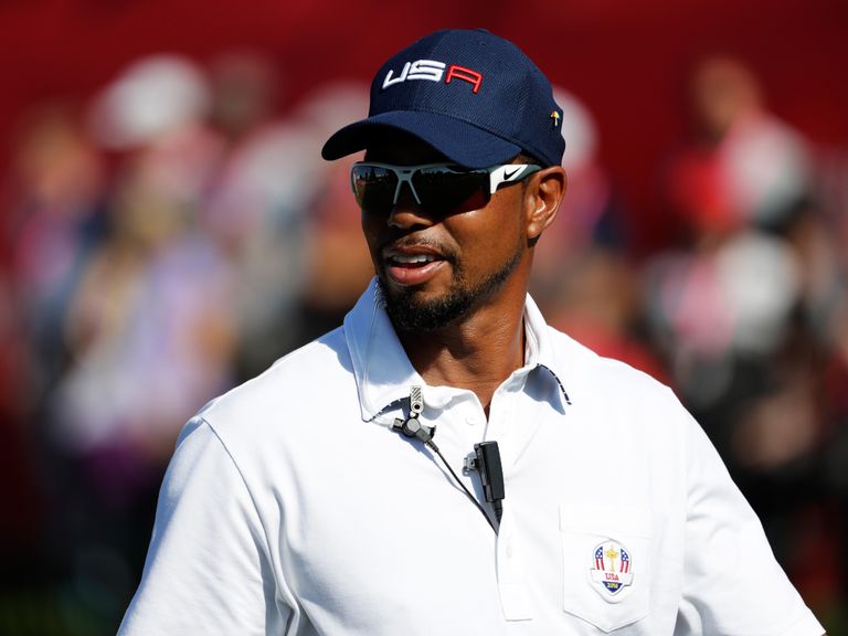 Tiger Woods postpones return saying his 