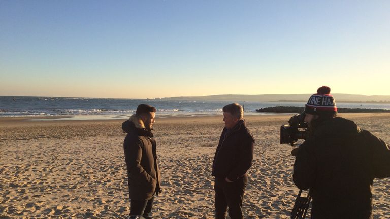 Wilshere talks to Geoff Shreeves on the beach in Bournemouth
